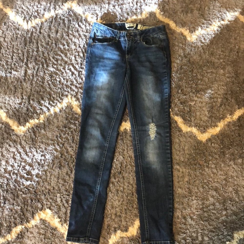 slightly ripped jeans